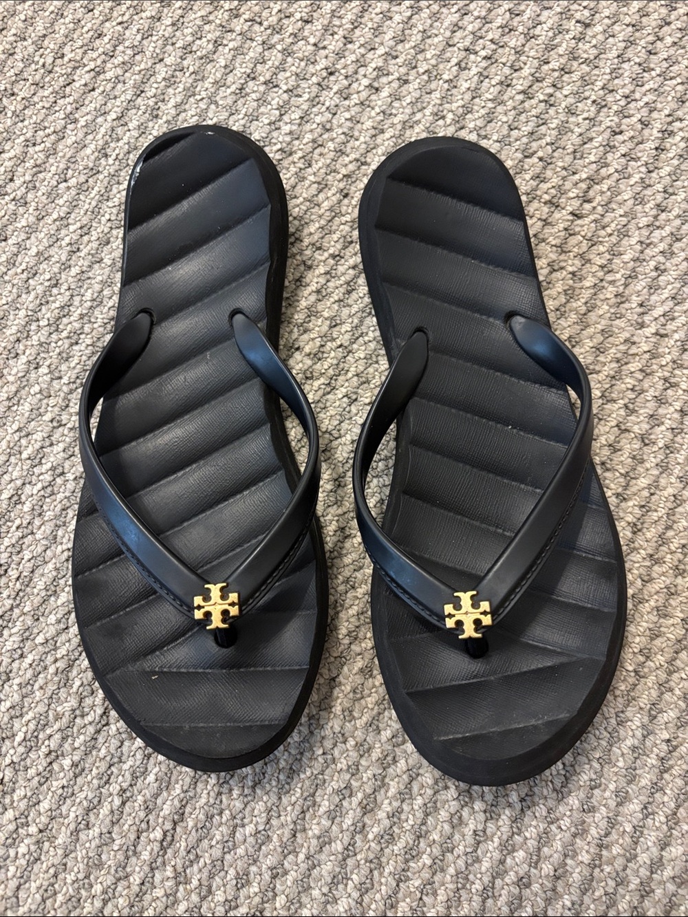 Tory Burch Black Flip Flops with Gold Logo Accent
